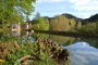 View across pond to the villa